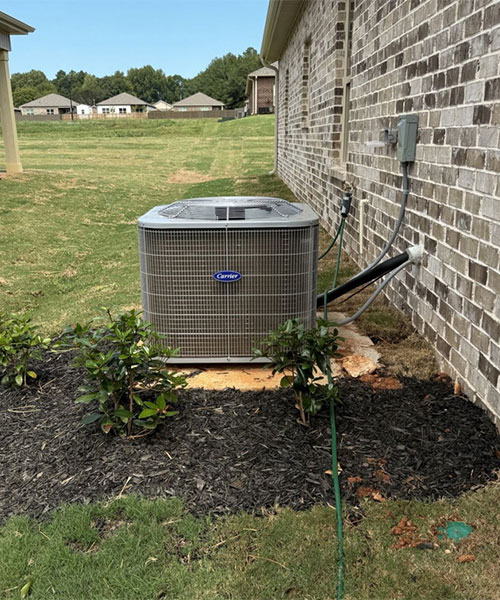 Outdoor heat pump system installed at a home in the Athens and Huntsville area
